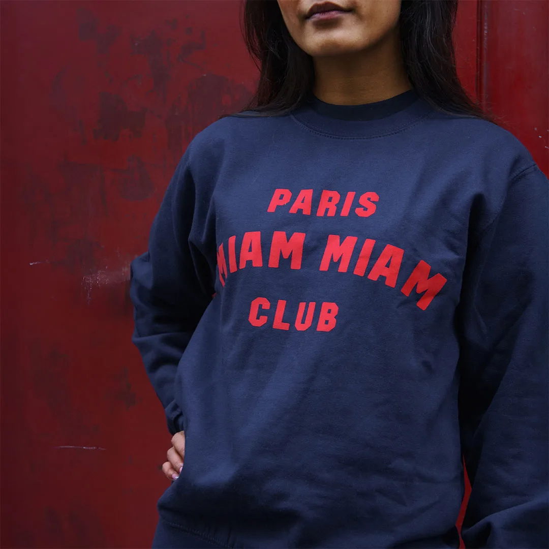 Close-up of the Paris Miam Miam Club sweatshirt worn by a model